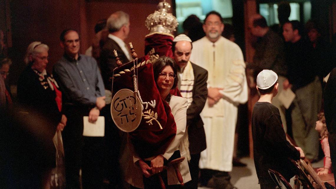 Torahs brought in to rededicate the sanctuary by congregational leaders at Congregation B’Nai Israel . (Photo by Dick Schmidt Sacramento Bee)