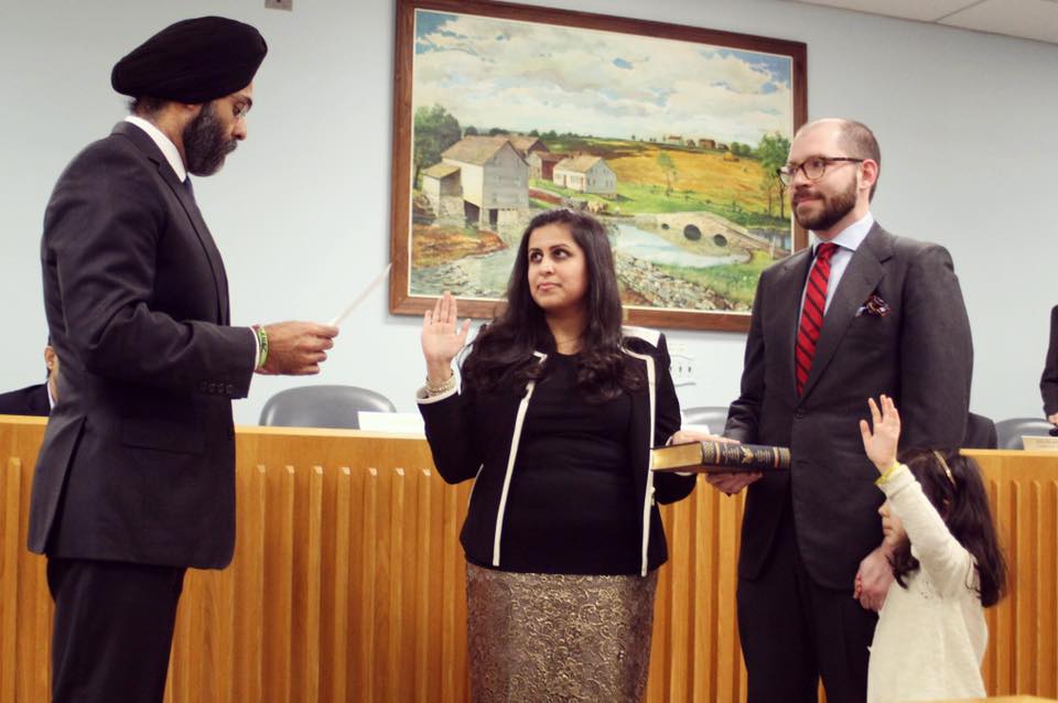 Sadaf Jaffer (center) is being sworn in as Mayor of Montgomery Township by New Jersey Attorney General Gurbir Grewal on January 3, 2019.
