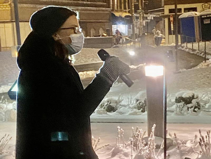 Bloomington City Council member and NIOT leader Mollie Ward addresses the crowd during a vigil Thursday night in front of the Law and Justice Center in Bloomington, Ill. WGLT