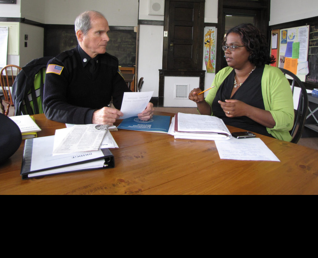 Gwen VanSant has worked with various town agencies to encourage multicultural training. She’s shown here with former Stockbridge Police Chief Rick Wilcox in 2015. Photo: David Scribner, The Berkshire Edge