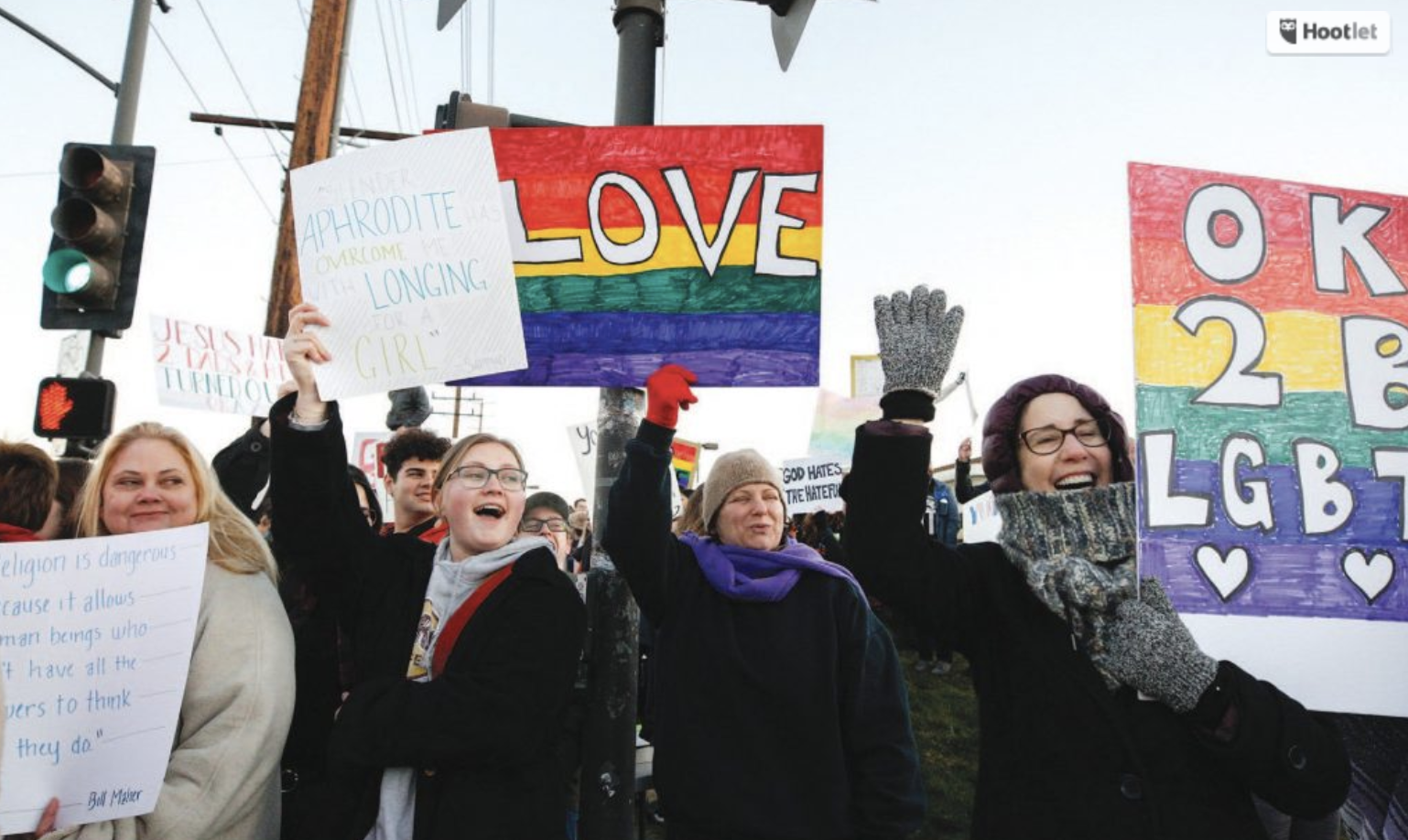 A crowd of 150 or more gather across the street from Thousand Oaks High School at 6:30 a.m. Monday to show their support for the LGBTQ community. RICHARD GILLARD/Acorn Newspapers